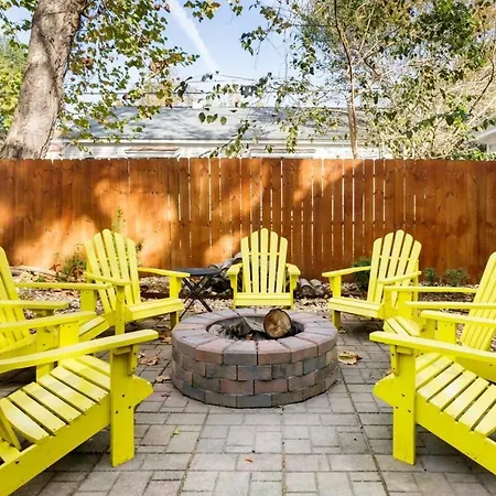 Vibrant, Colorful Condo Building With Backyard Firepit And Games
